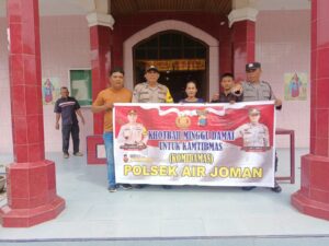 Personel Polsek Air Joman Berikan Pengamanan di Gereja HKBP Desa Punggulan