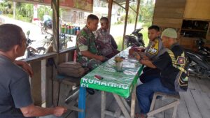 Personel Polsek Sei Kepayang Melaksanakan Cooling System di Desa Sei Lendir