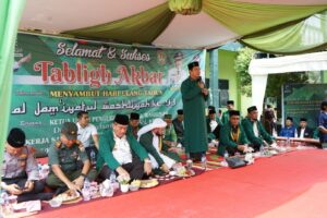 Dua Personil Polsek Air Joman Ikuti Tabligh Akbar Desa Punggulan Air Joman