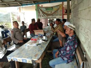 Personel Polsek Air Joman Ajak Masyarakat Laksanakan Cooling System