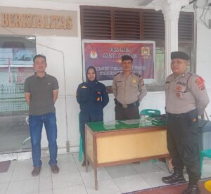 Personil Polres Asahan Lakukan Pengamanan Kantor KPU