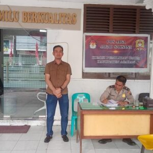 Personil Piket Pam Polres Asahan Lakukan Pengamanan dan pengawasan terhadap Kegiatan di Kantor KPU
