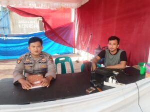 Personel Polres Asahan Lakukan Pengamanan Logistik di Kantor KPU