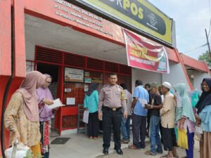Polsek Pulau Raja Monitoring Penyaluran Bantuan Beras Pemerintah