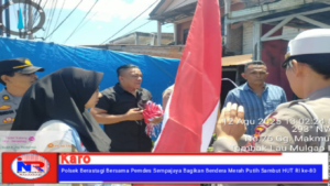 Polsek Berastagi Bersama Pemdes Sempajaya Bagikan Bendera Merah Putih Sambut HUT RI ke-80