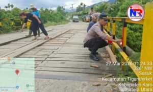 Kapolsek Payung dan Warga Kompak Bersihkan serta Cat Jembatan Bekerah Demi Keselamatan Pengguna Jalan